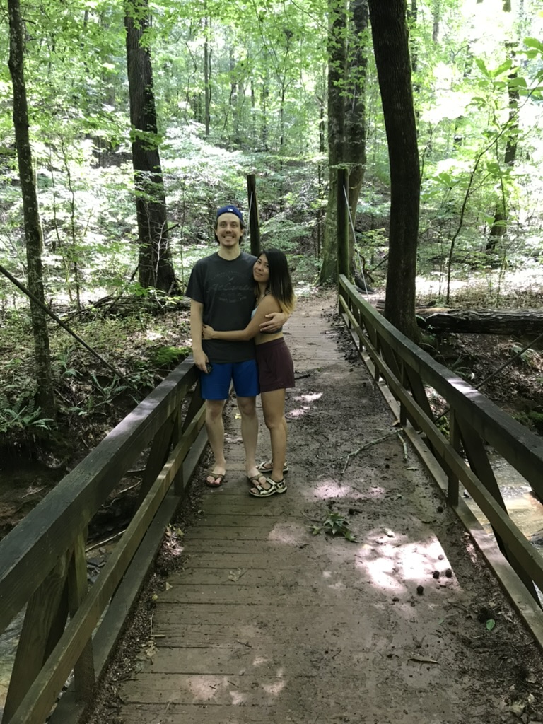 Jessica and Eskild walking in the forest